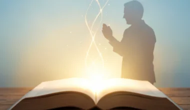 35 Powerful Blessing Prayers For Husband: A husband praying with divine light emanating from a book.